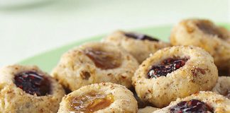 Thumbprint Cookies | Fill each cookie indentation with the jam or preserves of your choice.